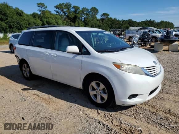 2015 Toyota Sienna LE AAS with VIN 5TDKK3DC1FS570779, listed as a Copart auction lot 70594095 with 170,193 mi miles and Salvage title. Bid and sale history available at DreamBid. Image 4.