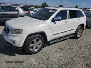 2012 Jeep Grand Cherokee Limited z VIN 1C4RJFBGXCC254576, wystawiony jako Copart lot #80382215 z przebiegiem 176 843 mil mil oraz Szkoda całkowita • Salvage title. Historia ofert i sprzedaży dostępna na DreamBid. Obrazek 1.