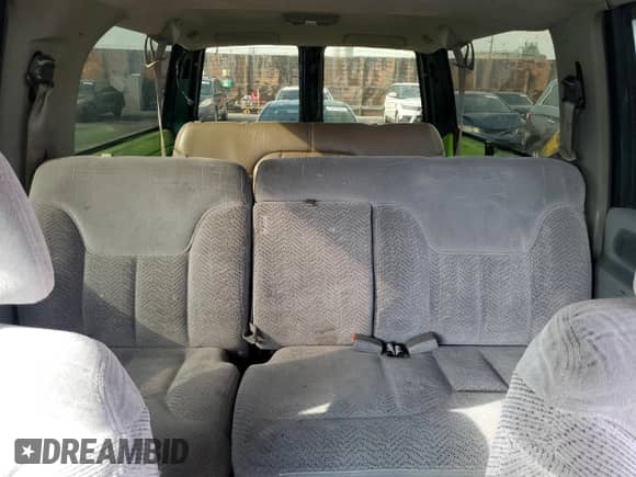 1997 Chevrolet Suburban with VIN 3GNFK16R4VG163602, listed as a Copart auction lot 76081984 with 243,169 mi miles and Salvage title. Bid and sale history available at DreamBid. Image 10.