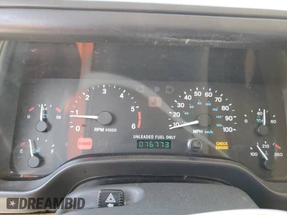 1997 Jeep Wrangler Sahara with VIN 1J4FY49S9VP452813, listed as a Copart auction lot 58079815 with 76,773 mi miles and Salvage title. Bid and sale history available at DreamBid. Image 9.