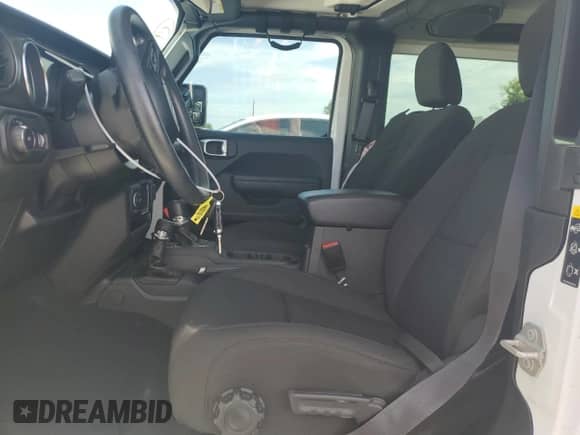 2023 Jeep Wrangler Sport с VIN 1C4GJXAN9PW633375, выставлен на аукционе Copart как лот 62821394 с пробегом 18 591 миль миль и Списание • Salvage title. История ставок и продаж доступна на DreamBid. Изображение 7.