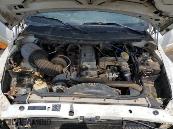 2000 Dodge 2500 with VIN 3B7KF2363YG114309, listed as a Copart auction lot 60270975 with 214,660 mi miles and Salvage title. Bid and sale history available at DreamBid. Image 11.