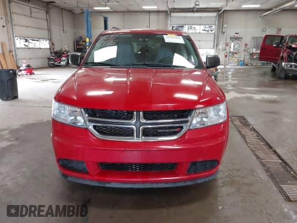 2014 Dodge Journey SE z VIN 3C4PDDAG5ET291031, wystawiony jako IAAI lot #42766496 z przebiegiem 227 965 mil mil oraz . Historia ofert i sprzedaży dostępna na DreamBid. Obrazek 13.