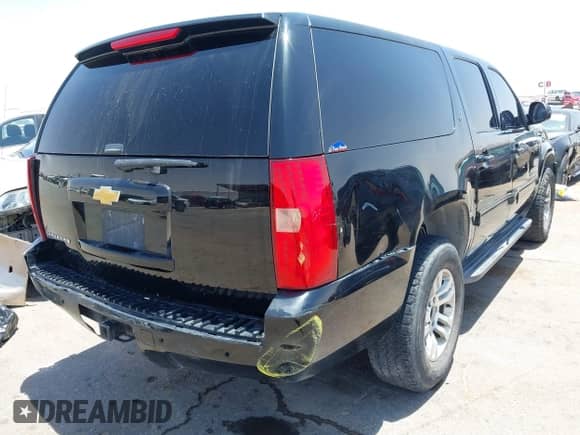 2013 Chevrolet Suburban LT with VIN 1GNSCJE02DR176393, listed as a IAAI auction lot 42483598 with 266,075 mi miles and . Bid and sale history available at DreamBid. Image 4.