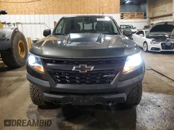 2018 Chevrolet Colorado 4WD ZR2 z VIN 1GCGTEEN0J1176761, wystawiony jako Copart lot #85403655 z przebiegiem 49 017 mil mil oraz Czysty tytuł • Clean title. Historia ofert i sprzedaży dostępna na DreamBid. Obrazek 5.