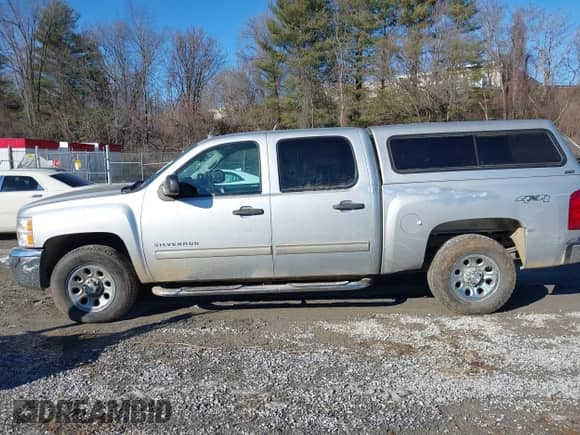 2013 Chevrolet Silverado 1500 LT with VIN 3GCPKSEA3DG237766, listed as a IAAI auction lot 41328496 with 105,466 mi miles and . Bid and sale history available at DreamBid. Image 14.