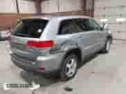 2017 Jeep Grand Cherokee 75th Anniversary z VIN 1C4RJFAGXHC749157, wystawiony jako IAAI lot #42017204 z przebiegiem 119 523 mil mil oraz . Historia ofert i sprzedaży dostępna na DreamBid. Obrazek 4.