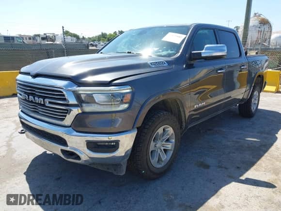 2020 Ram 1500 Laramie z VIN 1C6SRFJT7LN322837, wystawiony jako IAAI lot #42472602 z przebiegiem 64 032 mil mil oraz . Historia ofert i sprzedaży dostępna na DreamBid. Obrazek 17.