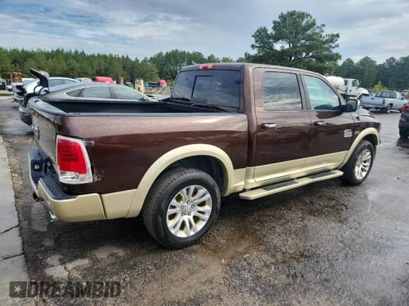 2015 Ram 1500 Laramie Longhorn with VIN 1C6RR7PT9FS520529, listed as a Copart auction lot 84201875 with 258,198 mi miles and Clean title. Bid and sale history available at DreamBid. Image 3.