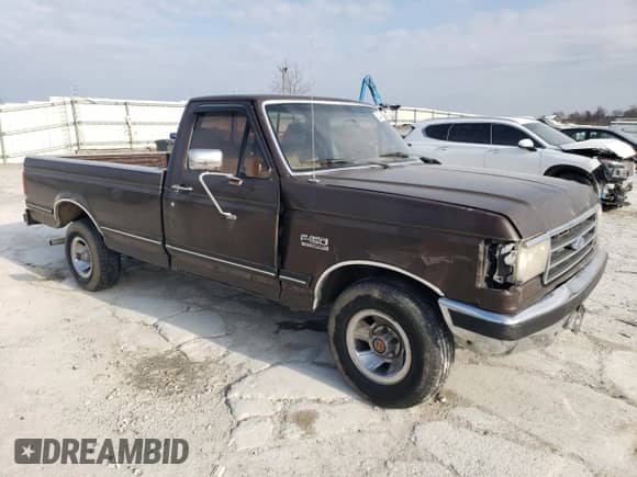 1991 Ford F-150 with VIN 1FTEF15N9MLA28124, listed as a Copart auction lot 83220464 with 49,411 mi miles and Salvage title. Bid and sale history available at DreamBid. Image 4.