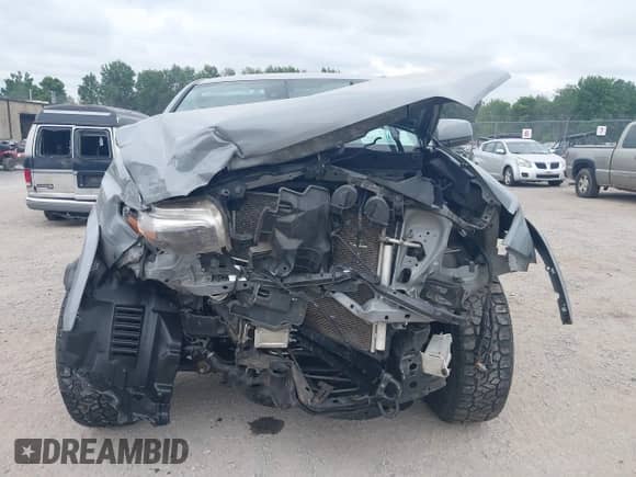 2021 Toyota Tacoma SR5 z VIN 3TMDZ5BN7MM106221, wystawiony jako IAAI lot #42827931 z przebiegiem 71 851 mil mil oraz . Historia ofert i sprzedaży dostępna na DreamBid. Obrazek 12.