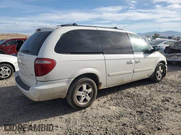 2005 Dodge Caravan SXT with VIN 2D4GP44L75R448581, listed as a Copart auction lot 71933275 with 311,694 mi miles and Salvage title. Bid and sale history available at DreamBid. Image 3.