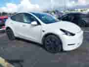 2024 Tesla Model Y с VIN 7SAYGDED0RF112915, выставлен на аукционе IAAI как лот 43396877 с пробегом 40 008 миль миль и . История ставок и продаж доступна на DreamBid. Изображение 1.