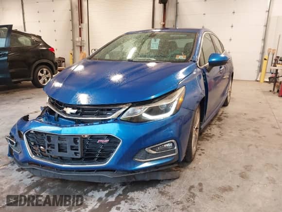 2017 Chevrolet Cruze Premier z VIN 1G1BF5SM3H7118351, wystawiony jako IAAI lot #43378142 z przebiegiem 64 471 mil mil oraz . Historia ofert i sprzedaży dostępna na DreamBid. Obrazek 17.