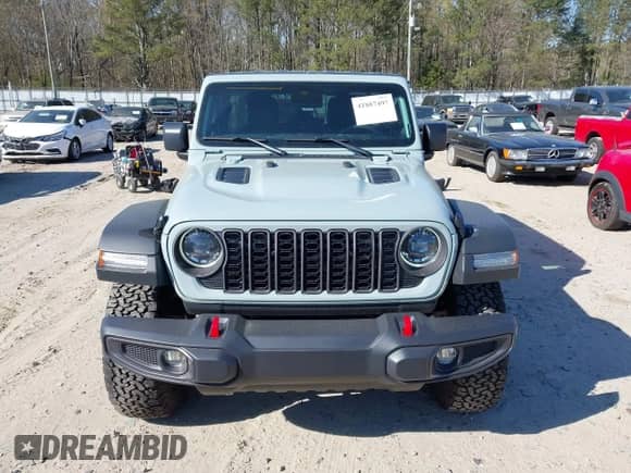 2024 Jeep Wrangler Rubicon z VIN 1C4PJXFG5RW268447, wystawiony jako IAAI lot #41887497 z przebiegiem 3 005 mil mil oraz . Historia ofert i sprzedaży dostępna na DreamBid. Obrazek 13.
