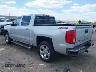 2018 Chevrolet Silverado 1500 LTZ z VIN 3GCUKSEC2JG186129, wystawiony jako IAAI lot #43319491 z przebiegiem 140 452 mil mil oraz . Historia ofert i sprzedaży dostępna na DreamBid. Obrazek 3.