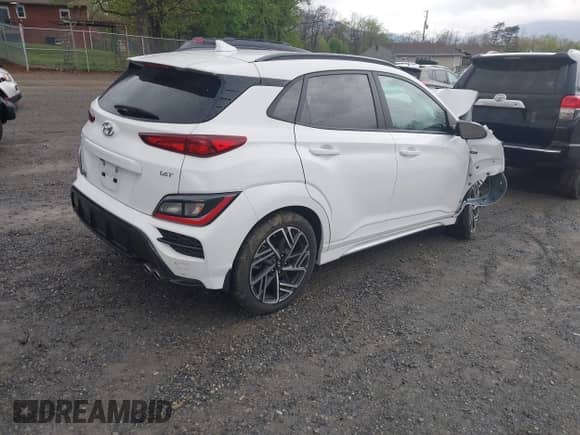 2023 Hyundai Kona N Line с VIN KM8K33A38PU999038, выставлен на аукционе IAAI как лот 42001429 с пробегом 15 569 миль миль и . История ставок и продаж доступна на DreamBid. Изображение 4.