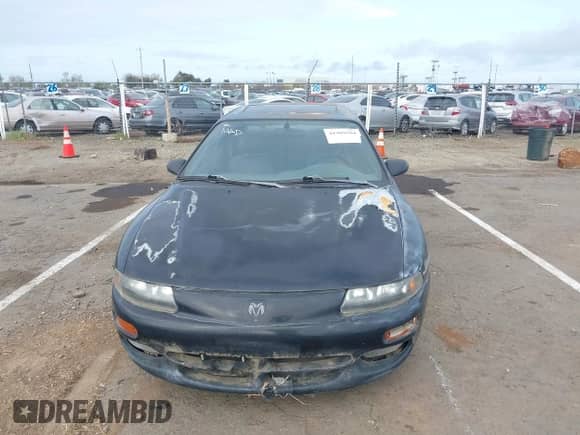 1996 Dodge Avenger with VIN 4B3AU52N6TE335141, listed as a IAAI auction lot 41909504 with 122,444 mi miles and . Bid and sale history available at DreamBid. Image 6.
