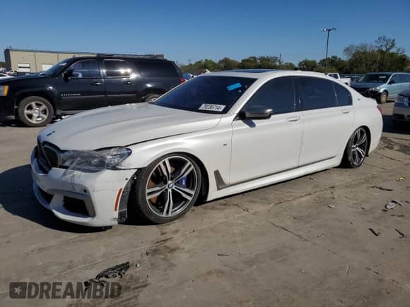2017 BMW 7 Series with VIN WBA7H6C30HG614434, listed as a Copart auction lot 79236714 with Not provided miles and Clean title. Bid and sale history available at DreamBid. Image 1.