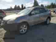 2010 Nissan Rogue S with VIN JN8AS5MV1AW107434, listed as a Copart auction lot 85366815 with 153,946 mi miles and Salvage title. Bid and sale history available at DreamBid. Image 1.