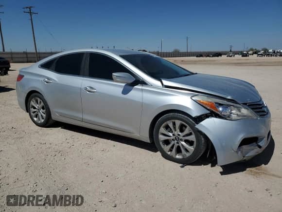 2012 Hyundai Azera with VIN KMHFG4JGXCA134727, listed as a Copart auction lot 50082345 with 125,725 mi miles and Salvage title. Bid and sale history available at DreamBid. Image 4.