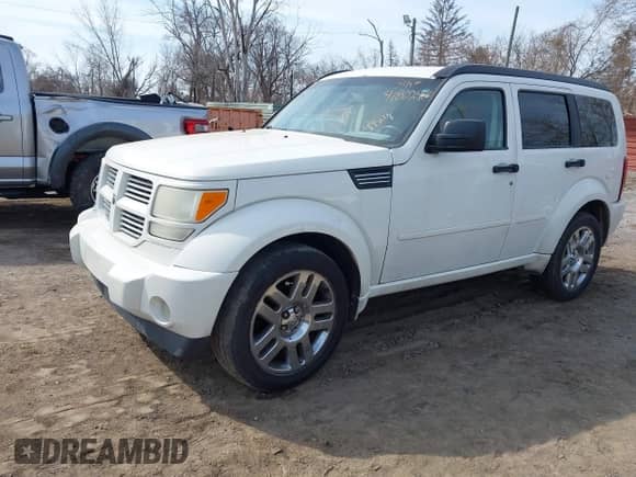 2007 Dodge Nitro R/T with VIN 1D8GU58687W720700, listed as a IAAI auction lot 41802485 with 203,575 mi miles and . Bid and sale history available at DreamBid. Image 17.