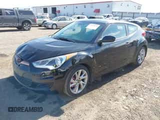 2016 Hyundai Veloster z VIN KMHTC6AD1GU292457, wystawiony jako IAAI lot #43419828 z przebiegiem 105 746 mil mil oraz . Historia ofert i sprzedaży dostępna na DreamBid. Obrazek 2.