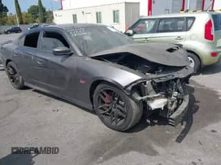 2019 Dodge Charger Scat Pack z VIN 2C3CDXGJ4KH564018, wystawiony jako IAAI lot #43324116 z przebiegiem 61 977 mil mil oraz . Historia ofert i sprzedaży dostępna na DreamBid. Obrazek 1.