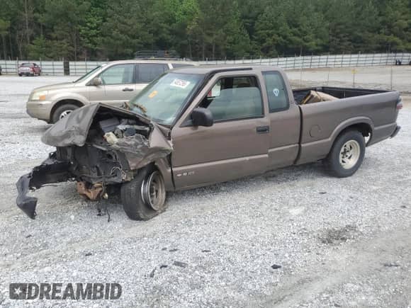 1999 Chevrolet S-10 LS с VIN 1GCCS19XXX8169080, выставлен на аукционе Copart как лот 54657295 с пробегом Не указан миль и Списание • Salvage title. История ставок и продаж доступна на DreamBid. Изображение 1.