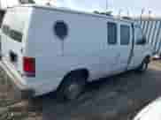 2002 Ford Econoline Cargo with VIN 1FTRE14262HB84357, listed as a IAAI auction lot 40880551 with 123,183 mi miles and . Bid and sale history available at DreamBid. Image 4.