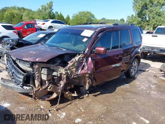 2013 Honda Pilot EX-L with VIN 5FNYF4H55DB040980, listed as a IAAI auction lot 42831295 with Not provided miles and . Bid and sale history available at DreamBid. Image 22.