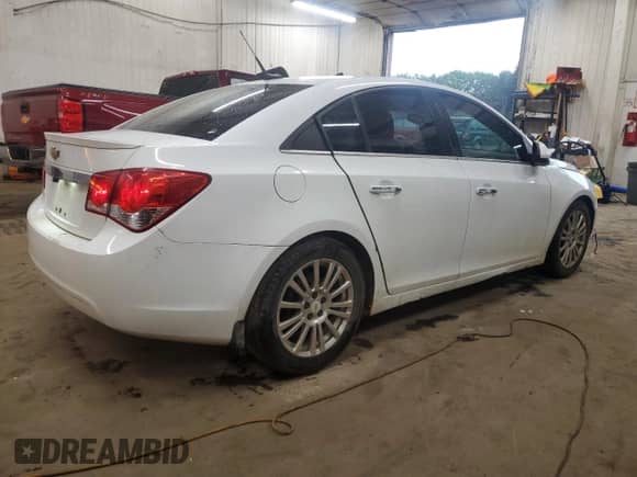 2012 Chevrolet Cruze ECO с VIN 1G1PK5SC2C7104152, выставлен на аукционе Copart как лот 81634825 с пробегом 218 455 миль миль и Списание • Salvage title. История ставок и продаж доступна на DreamBid. Изображение 3.