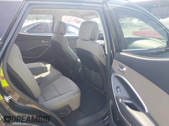 2015 Hyundai Santa Fe z VIN 5XYZU3LB0FG284923, wystawiony jako IAAI lot #43246696 z przebiegiem 96 991 mil mil oraz . Historia ofert i sprzedaży dostępna na DreamBid. Obrazek 8.