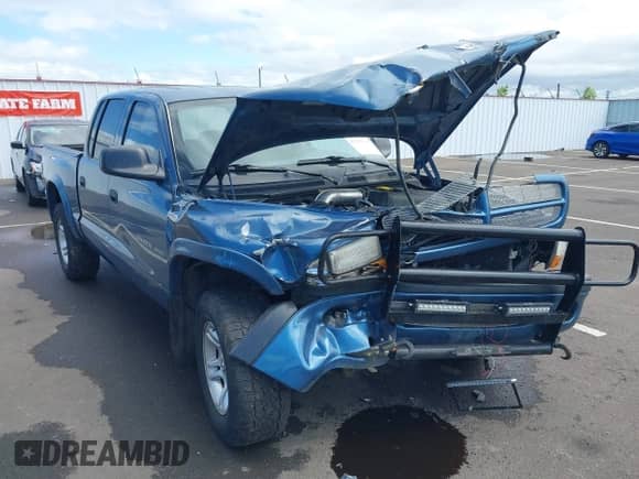 2002 Dodge Dakota Sport с VIN 1B7HG38N52S663684, выставлен на аукционе IAAI как лот 42302768 с пробегом 283 663 миль миль и . История ставок и продаж доступна на DreamBid. Изображение 6.