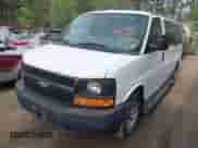 2012 Chevrolet Express Passenger LS z VIN 1GNSGBF49C1189621, wystawiony jako IAAI lot #42039283 z przebiegiem 72 271 mil mil oraz . Historia ofert i sprzedaży dostępna na DreamBid. Obrazek 2.