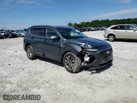 2020 Hyundai Santa Fe Limited с VIN 5NMS5CADXLH257099, выставлен на аукционе Copart как лот 70456495 с пробегом 79 532 миль миль и Списание • Salvage title. История ставок и продаж доступна на DreamBid. Изображение 14.