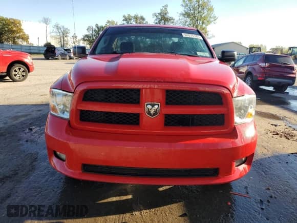 2012 Ram 1500 Express with VIN 3C6JD7AT0CG263039, listed as a Copart auction lot 84575185 with 202,886 mi miles and Salvage title. Bid and sale history available at DreamBid. Image 5.