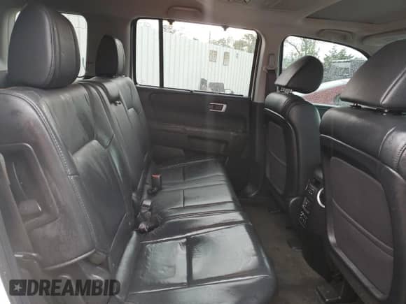 2015 Honda Pilot Touring z VIN 5FNYF3H94FB018551, wystawiony jako Copart lot #82041355 z przebiegiem 137 502 mil mil oraz Szkoda całkowita • Salvage title. Historia ofert i sprzedaży dostępna na DreamBid. Obrazek 11.