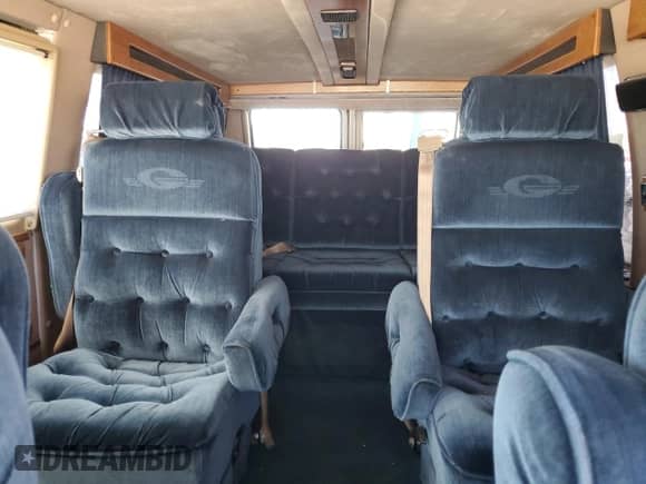1995 Chevrolet Chevy Van с VIN 1GBEG25K4SF190770, выставлен на аукционе Copart как лот 84057735 с пробегом 176 001 миль миль и Чистый • Clean title. История ставок и продаж доступна на DreamBid. Изображение 10.