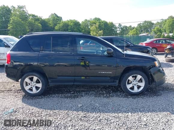 2012 Jeep Compass Latitude with VIN 1C4NJDEB8CD604882, listed as a IAAI auction lot 42612714 with 226,893 mi miles and . Bid and sale history available at DreamBid. Image 14.