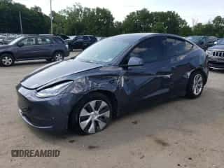 2021 Tesla Model Y Long Range with VIN 5YJYGDEE5MF257320, listed as a Copart auction lot 63980974 with 89,016 mi miles and Salvage title. Bid and sale history available at DreamBid. Image 1.
