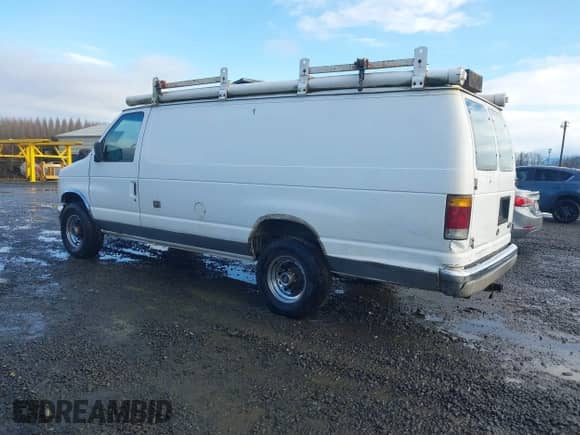 1992 Ford Econoline Cargo with VIN 1FTHS24H5NHB42507, listed as a IAAI auction lot 41512347 with 373,987 mi miles and . Bid and sale history available at DreamBid. Image 3.