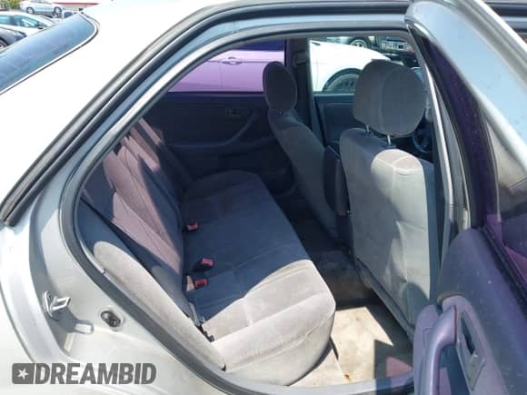 2001 Toyota Camry LE z VIN 4T1BG22K31U043493, wystawiony jako IAAI lot #42986379 z przebiegiem 213 223 mil mil oraz . Historia ofert i sprzedaży dostępna na DreamBid. Obrazek 8.