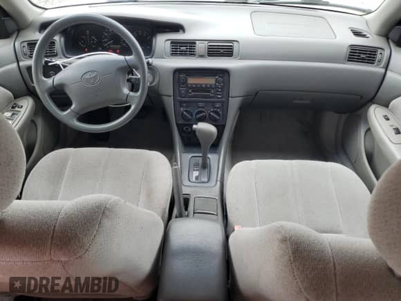 2001 Toyota Camry CE z VIN 4T1BG22K21U097187, wystawiony jako Copart lot #84552315 z przebiegiem 107 215 mil mil oraz Szkoda całkowita • Salvage title. Historia ofert i sprzedaży dostępna na DreamBid. Obrazek 8.