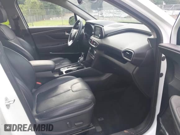 2020 Hyundai Santa Fe SEL with VIN 5NMS3CAA4LH176420, listed as a IAAI auction lot 42472600 with 59,221 mi miles and . Bid and sale history available at DreamBid. Image 5.