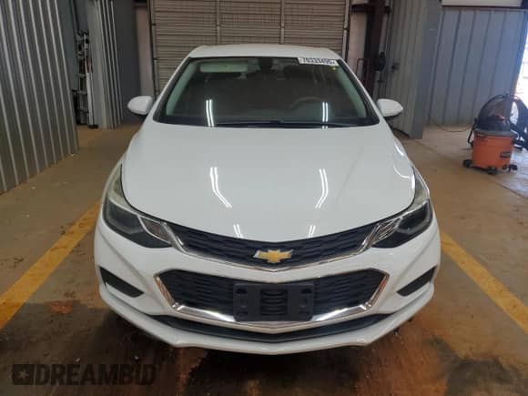 2017 Chevrolet Cruze LT с VIN 3G1BE6SM5HS570909, выставлен на аукционе Copart как лот 70333495 с пробегом 39 739 миль миль и Списание • Salvage title. История ставок и продаж доступна на DreamBid. Изображение 5.