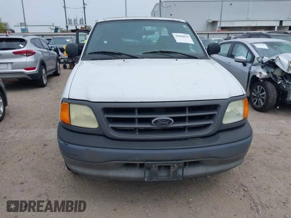 2004 Ford F-150 XL with VIN 2FTRX17W34CA64793, listed as a IAAI auction lot 41868636 with 349,765 mi miles and . Bid and sale history available at DreamBid. Image 6.