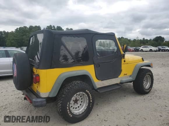 2000 Jeep Wrangler SE with VIN 1J4FA29P0YP775110, listed as a Copart auction lot 71498795 with 72,782 mi miles and Clean title. Bid and sale history available at DreamBid. Image 3.