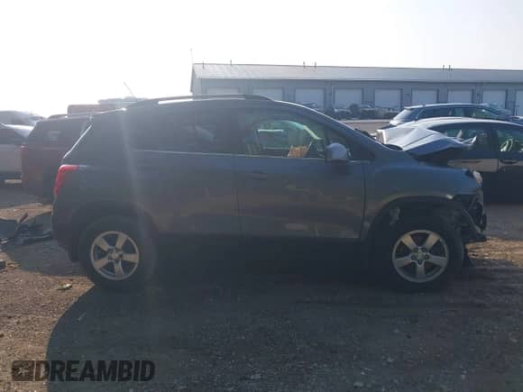 2015 Chevrolet Trax LT z VIN KL7CJRSBXFB137194, wystawiony jako IAAI lot #42395864 z przebiegiem 141 136 mil mil oraz . Historia ofert i sprzedaży dostępna na DreamBid. Obrazek 14.