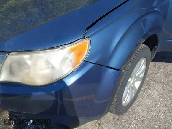 2012 Subaru Forester X Premium z VIN JF2SHACC8CH466036, wystawiony jako IAAI lot #43352225 z przebiegiem 153 270 mil mil oraz . Historia ofert i sprzedaży dostępna na DreamBid. Obrazek 6.